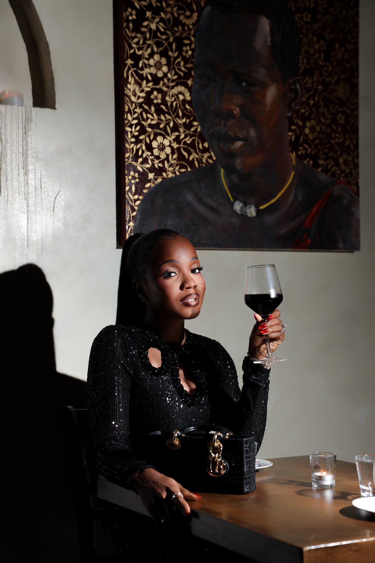 Moon Wurie editorial portrait with wine